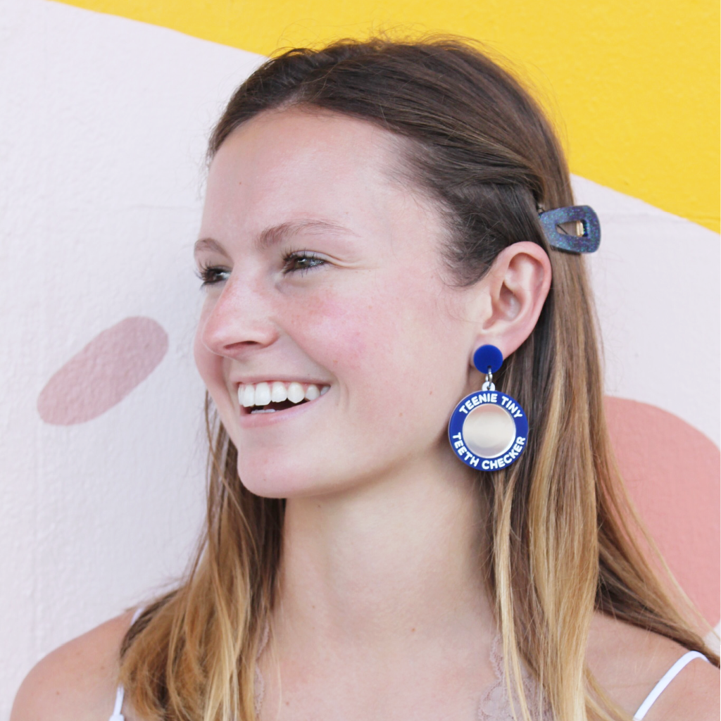 woman wearing things by bean teenie tiny teeth checker earrings in blue - cocoandduckie.com