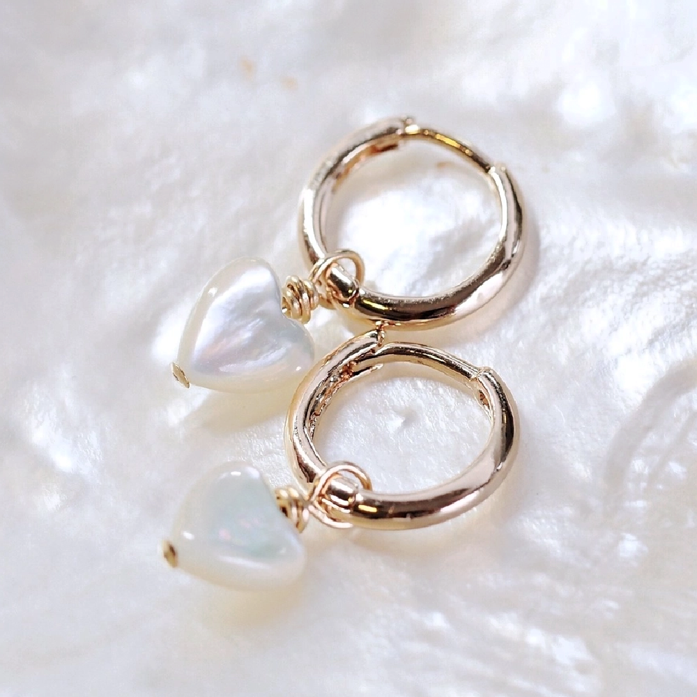 mother-of-pearl-heart-charm-and-gold-huggie-hoop-earrings
