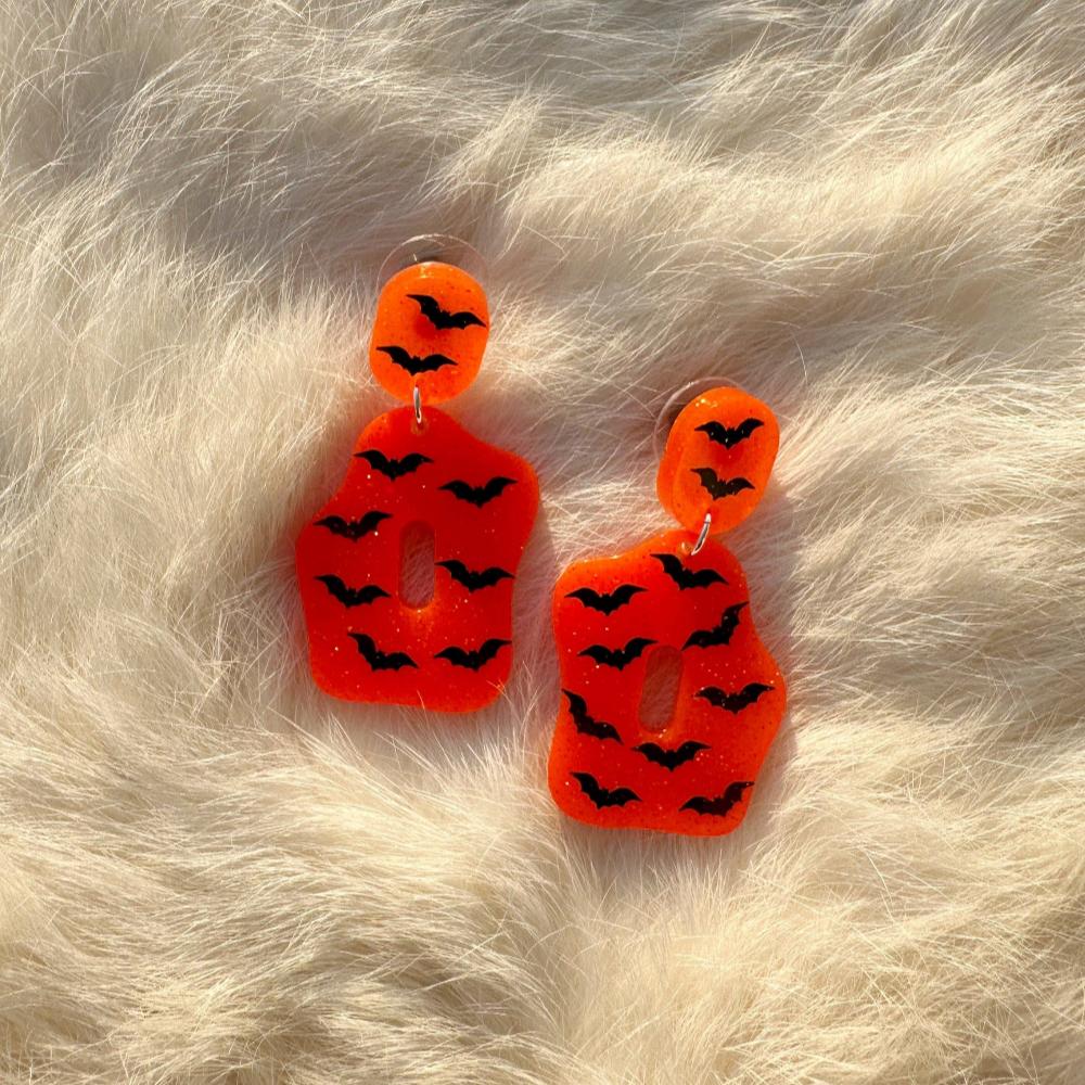 orange-glow-bat-pepper-earrings